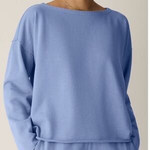 Casual Eileen Fisher dark Periwinkle lounging top, and pants.